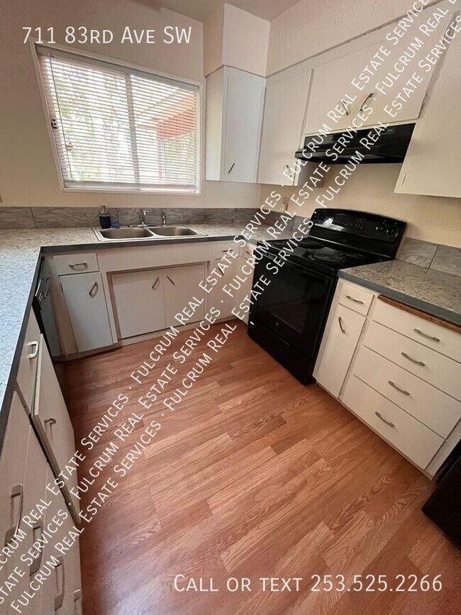 Building Photo - 711 83rd Ave SW