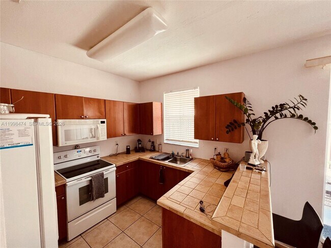 Building Photo - 12212 SW 124th Path