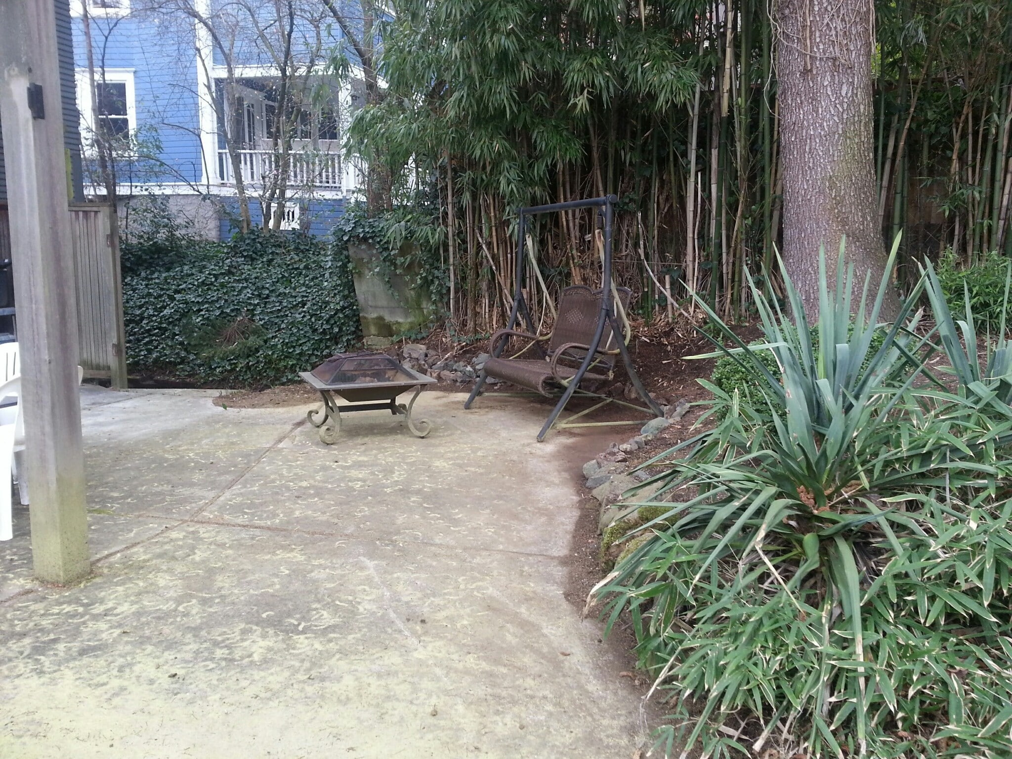 Backyard fire pit and swing. - 1867 SW 14th Ave