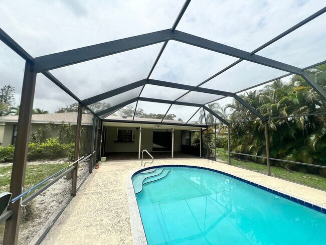 Primary Photo - BEAUTIFUL 3 BEDROOM POOL HOME IN SANDPIPER...