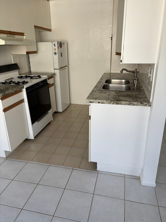 Building Photo - 4441 Woodman Ave