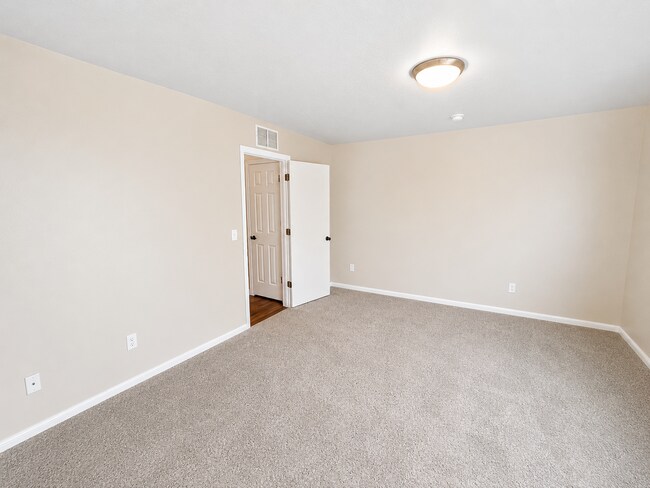 Building Photo - Easy-Living 3 Bed, 2 Bath Home with Double Garage, Pool Access & Private Courtyard