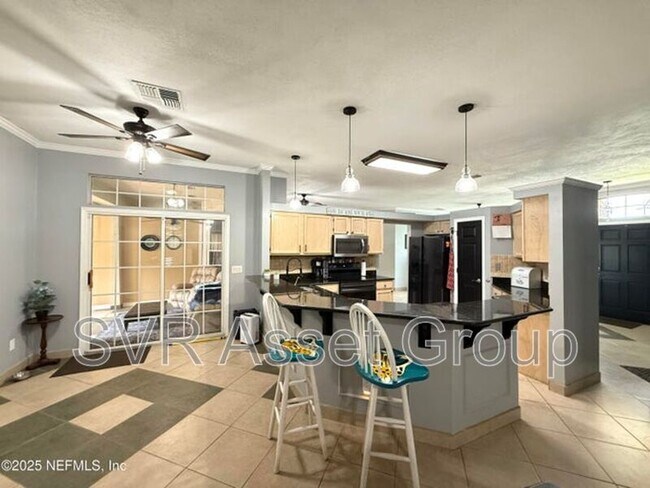 Building Photo - 12950 Deep River Way