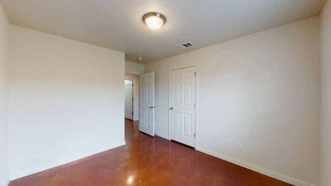 Building Photo - ALL STAINED CONCRETE FLOORING DUPLEX IN HA...