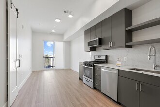 Building Photo - Luxe Condo Near Regis With Covered Parking Included