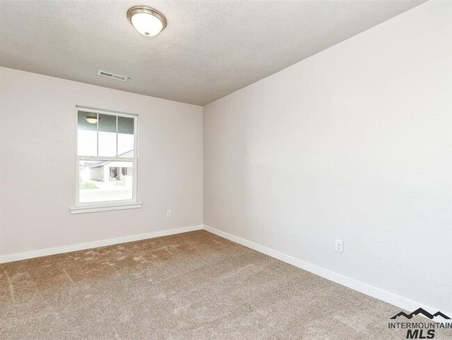 Building Photo - Charming 3 Bedroom Home in Nampa _ Pet Fri...