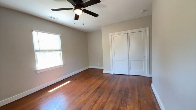 Building Photo - Charming 2BR with Sunroom, Hardwood Floors & Lawn Care Included