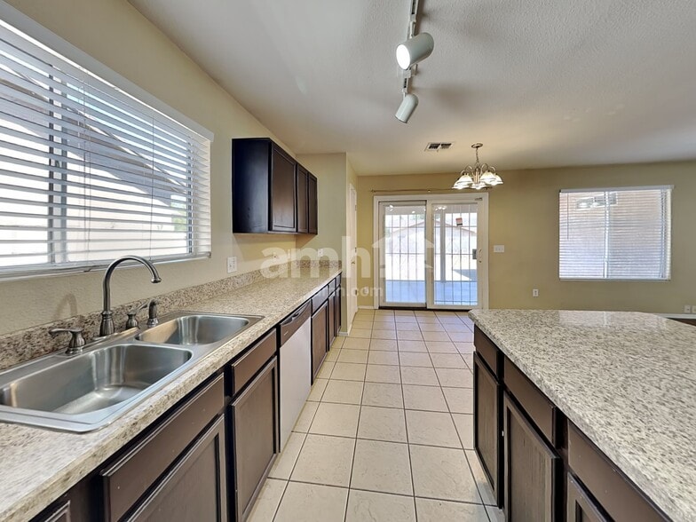 Building Photo - 5895 E Tercel Dr