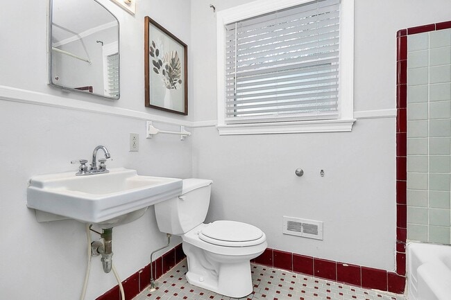 Building Photo - Discover the charm of this brick ranch nestled in the heart of Madison Park