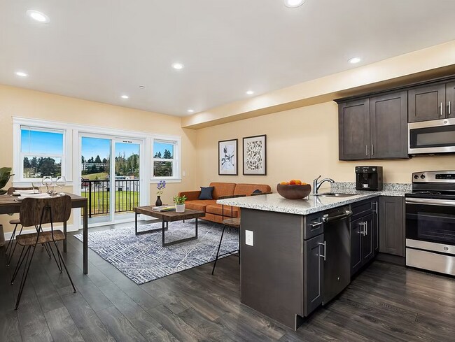 Building Photo - Spacious Two-Bedroom, Two-Bath Living at Marigold Apartments — Available Now