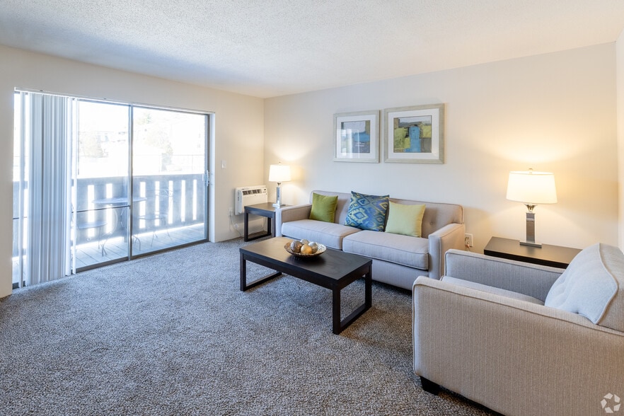 1BR, 1BA Standard 700sf - Living Room- Pebblebrook Apartments - Pebblebrook - Heat, Water and Gas Included!