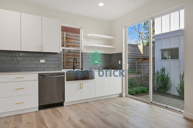 Building Photo - Modern Northwest-Danish Inspired Townhome with Standalone Cottage Feel in Seattle’s Central District