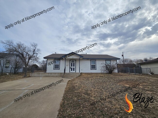 Primary Photo - Spacious 3-Bedroom Home with Large Backyard