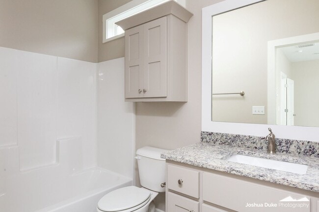 Building Photo - Now Pre-Leasing — Brand-New Luxury Townhom...