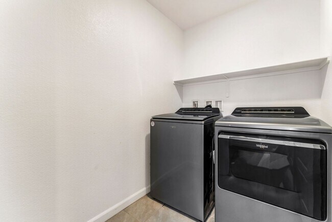Building Photo - Modern Gated Townhome Living with Resort-Style Community Amenities