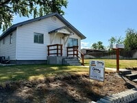 Building Photo - For Rent: 2 Bedroom, 1 Bathroom Home with Garage and Large Yard