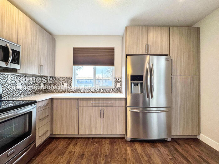 Building Photo - 8130 W 10th Ave