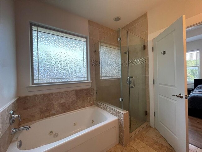 Building Photo - Spacious 2-bedroom, 2.5-bath condo available!