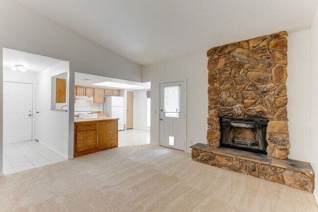 Building Photo - Charming 2 Bed, 2 Bath Condo with Fireplace & Balcony! 89011