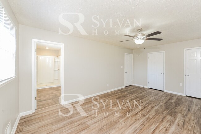 Building Photo - Welcome to this charming abode.