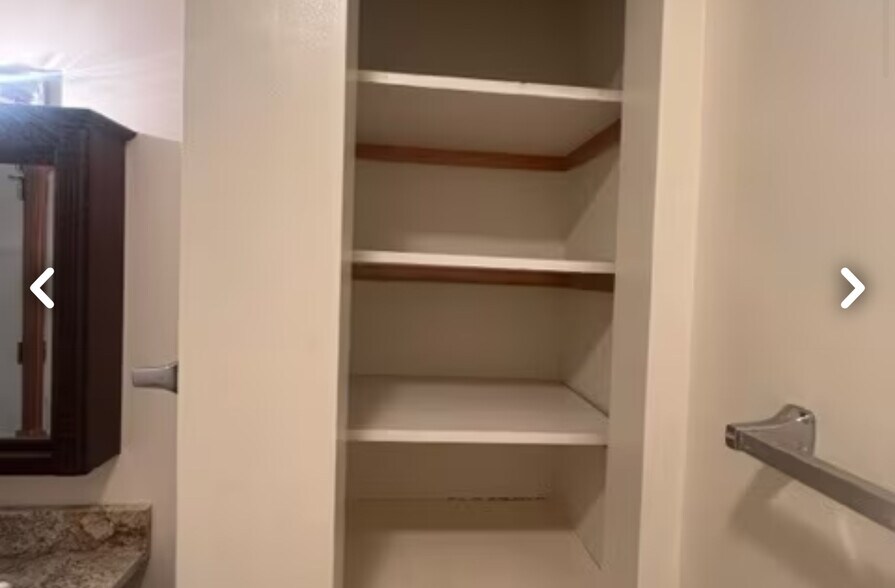 Bathroom linen storage. - 26 Rochester St