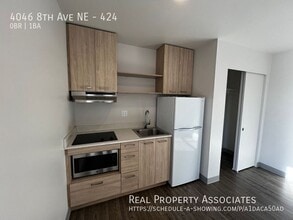 Building Photo - 4046 8th Ave NE