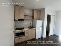 Building Photo - 4046 8th Ave NE