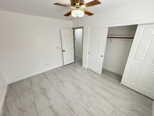 Building Photo - This inviting single-story home boasts a s...