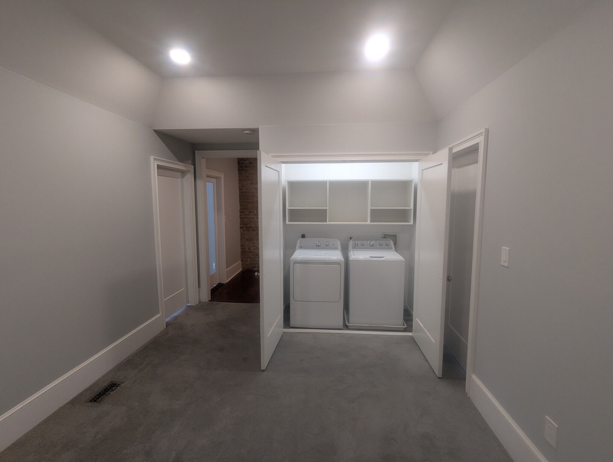 Den (Concealed laundry with built-in storage) - 35 Clinton Ave