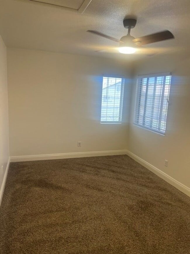 Building Photo - This three bedroom has the primary bedroom on the downstairs level.