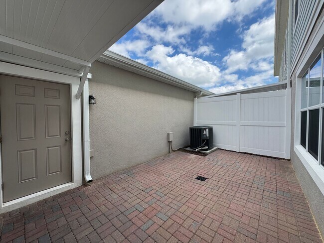 Building Photo - Available Now! Spacious 3-Bedroom Townhome with Fenced Yard in Winter Garden – Washer and Dryer I...