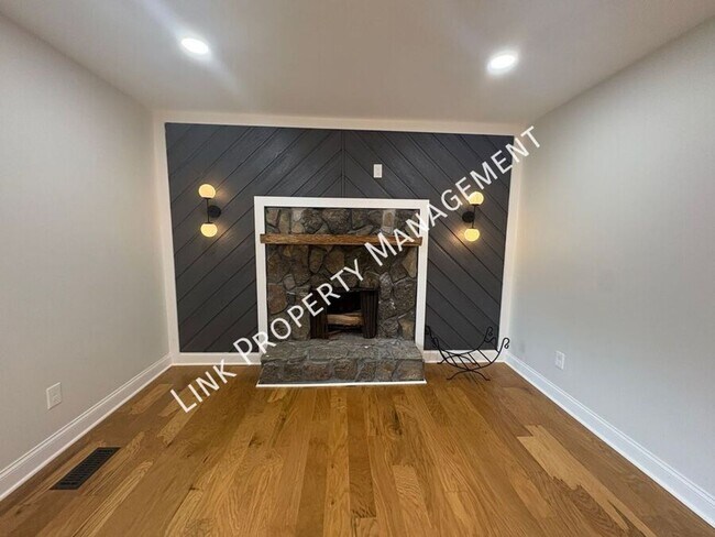 Building Photo - JUST REDUCE!  Sophisticated Tri-Level Home in Stuart Heights — Modern Comfort & Timeless Charming...