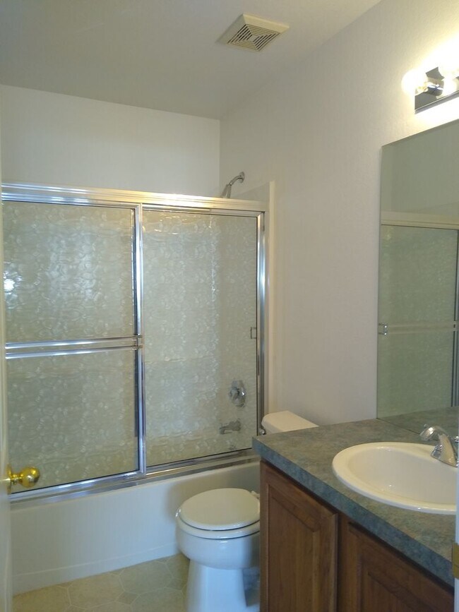 Building Photo - HUGE 3 Bedroom 3 Bath Home in Gated Community