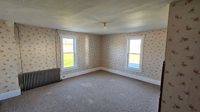 Building Photo - Country Living in This 4 Bedroom Farmhouse!