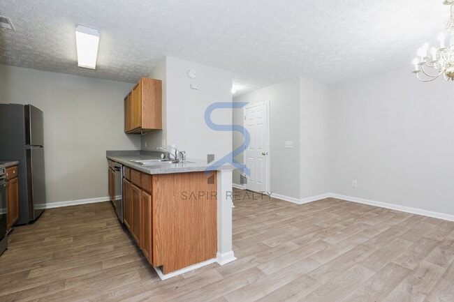 Building Photo - Move in before February 15th and choose your reward: a $250 Amazon Gift Card or a 55" Smart TV!