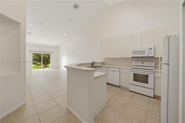 Building Photo - 3393 NE 11th Dr