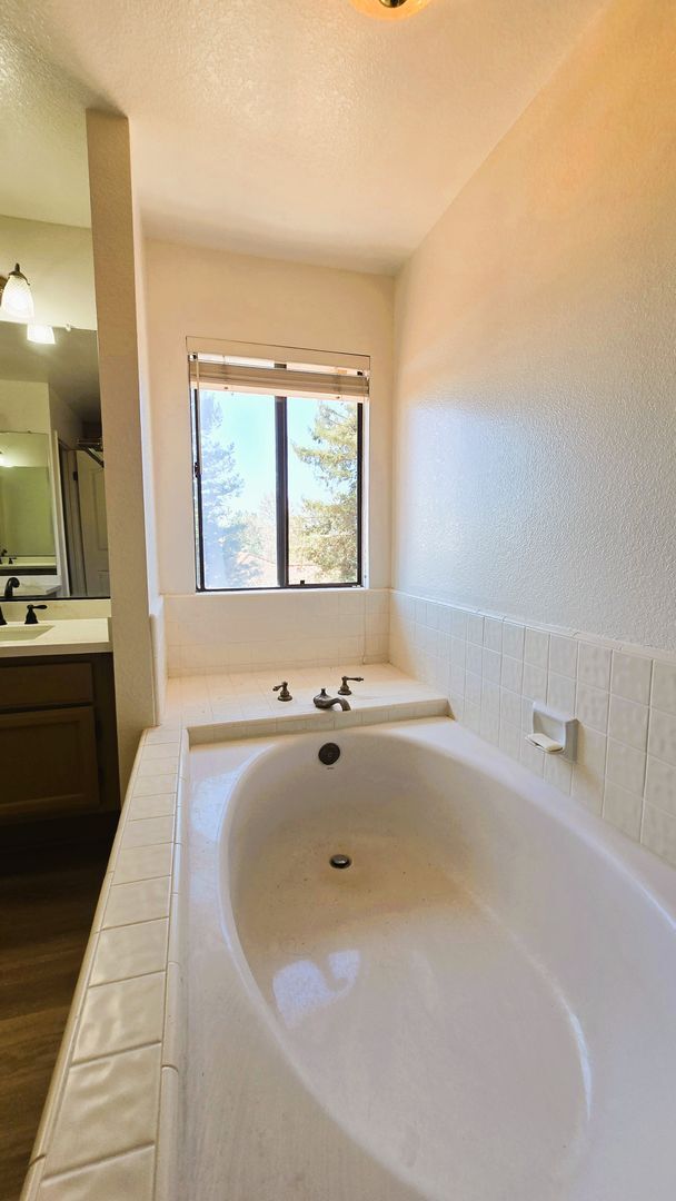 Building Photo - "Spacious, Sunlit Home in a Peaceful Ranch...