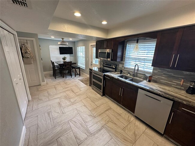 Building Photo - 7327 Floral Cir E