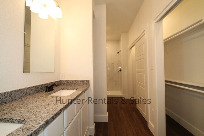 Building Photo - Upscale Four-Bedroom Townhome!
