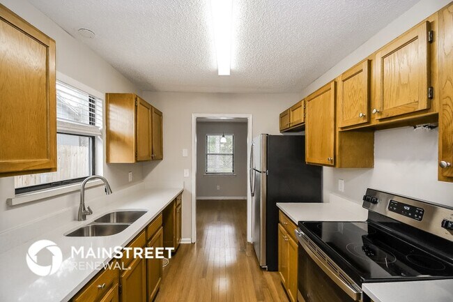 Building Photo - 7969 Sweet Rose Ln E