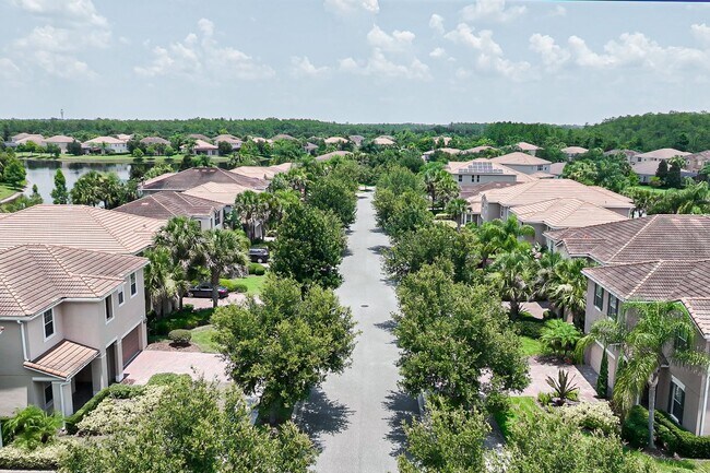 Building Photo - Beautiful 3/3 w/ 2 Car Garage in Gated Vil...