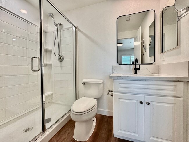 Building Photo - Beautifully Remodel Townhouse with AC & Two Car Garage!