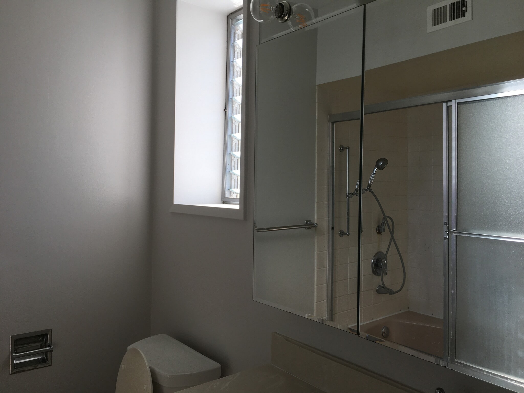 bathroom with Window tub/shower combo - 2501 Golden Rain Rd