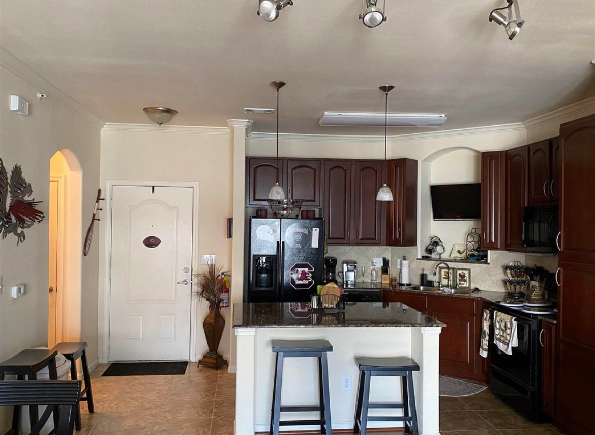 Kitchen with island. - 1085 Shop Rd