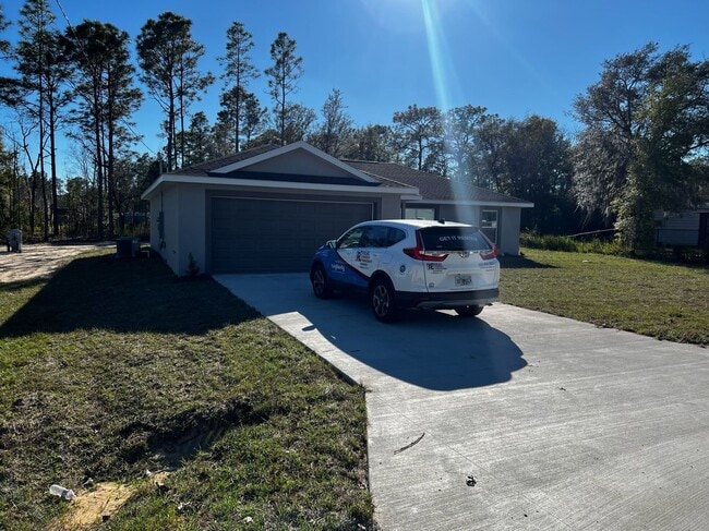 Building Photo - New Construction Custom Home - Desirable SE Ocala Neighborhood 3/2/2 **WON"T LAST**