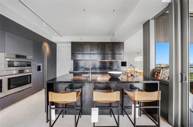 Building Photo - 9705 Collins Ave