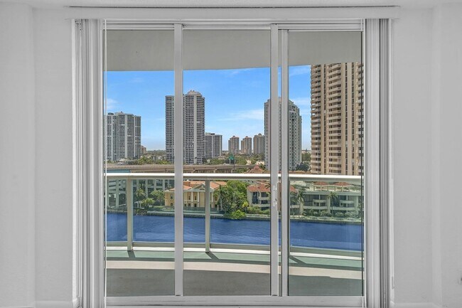 Building Photo - 19390 Collins Ave