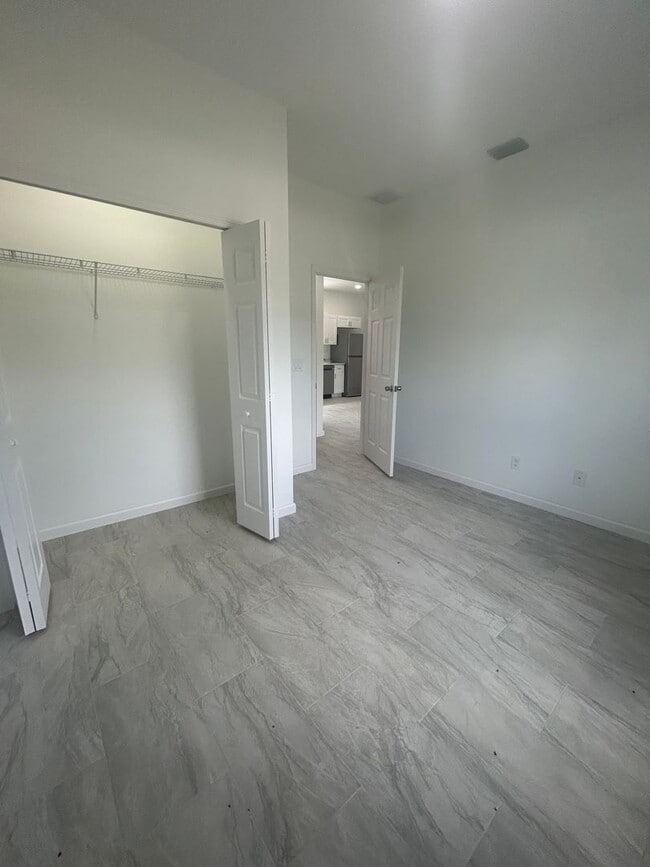 Building Photo - JUST BUILT! Modern 3 Bed / 2 Bath Home with Garage in Serene Lake Placid