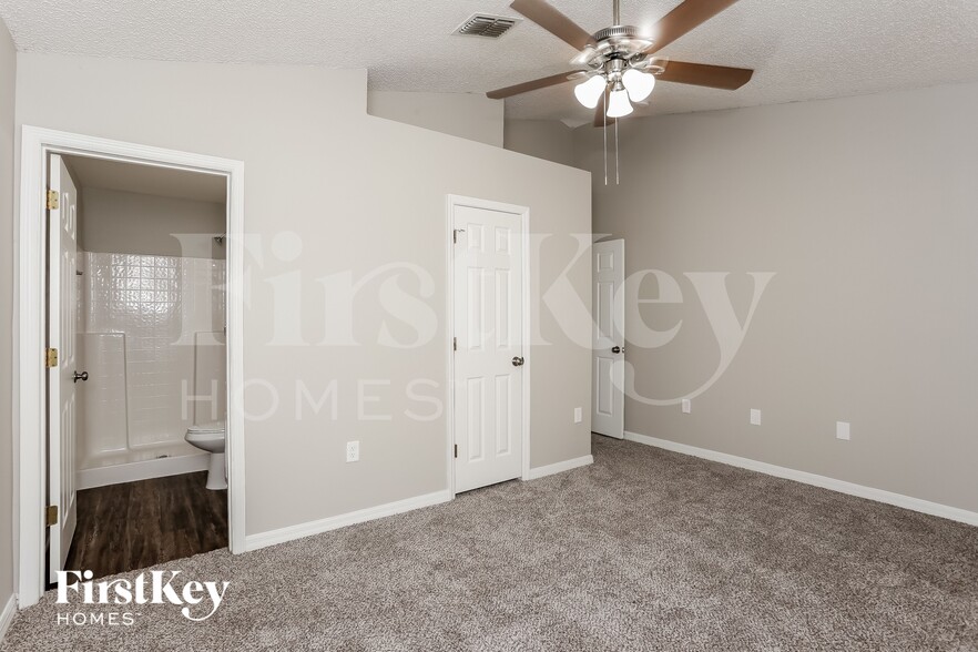 Building Photo - 6671 Gentle Oaks Dr N