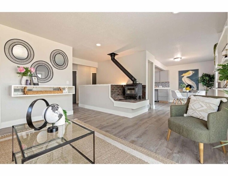 Living room with wood burning stove - 500 Forest Dr
